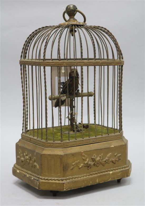 An automaton bird in a cage